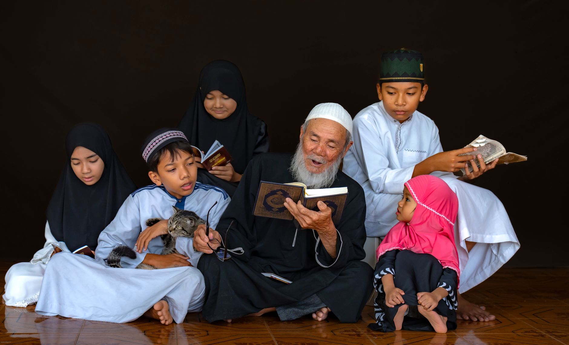 Ilustrasi: A multigenerational family reading the Quran together, emphasizing togetherness and faith.